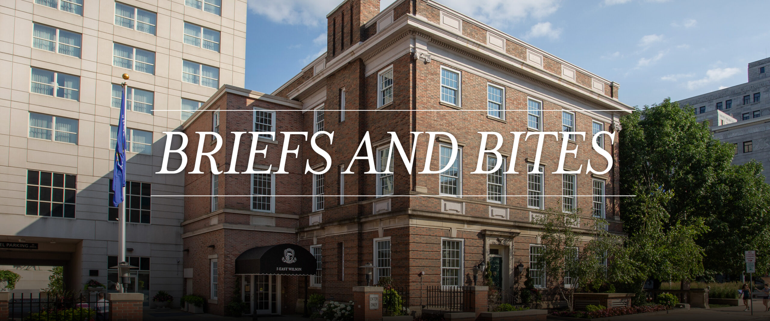 Briefs and Bites text overlayed on a photograph of the Wisconsin Law School