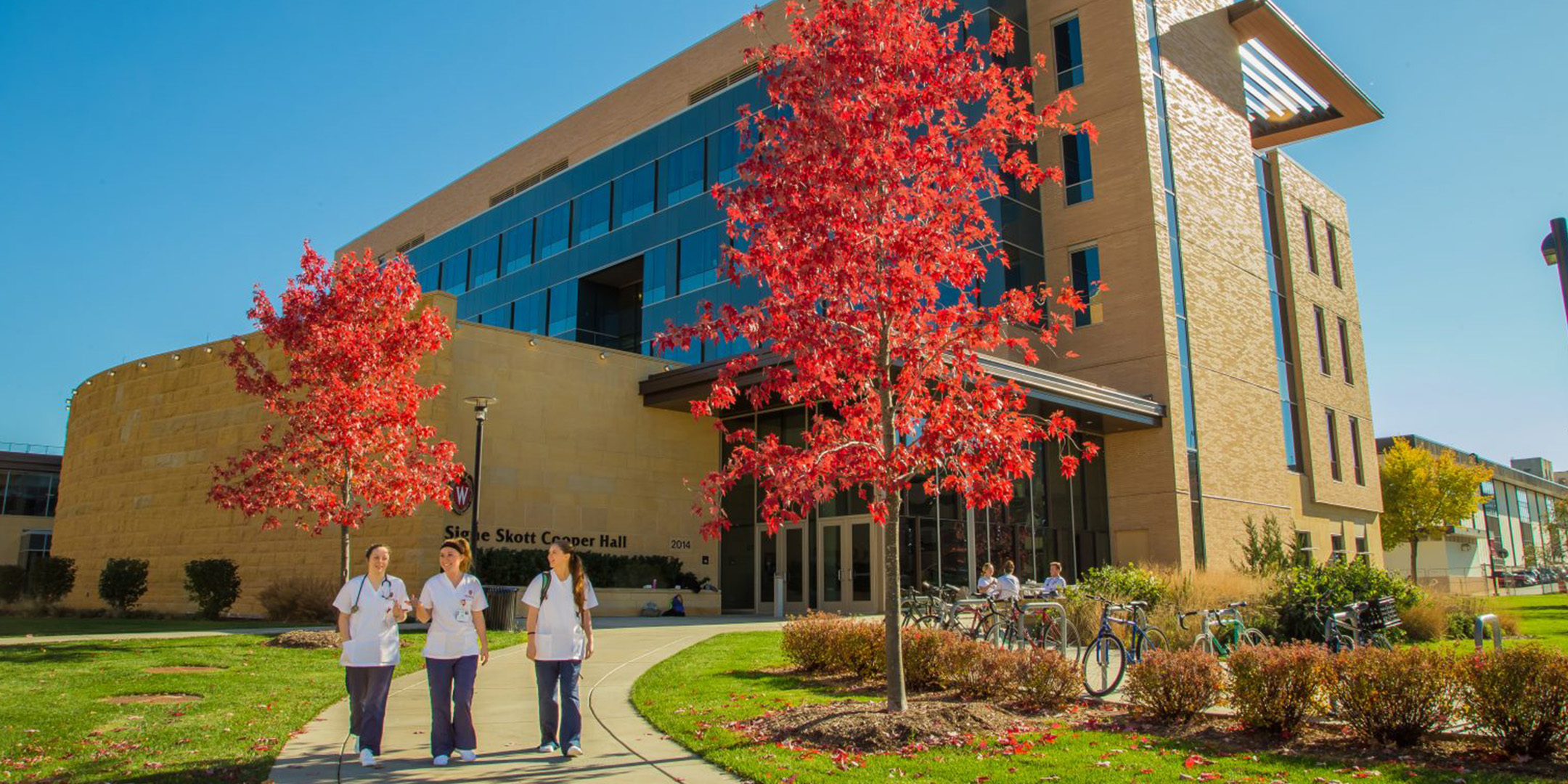 Nursing students walking outside of the School of Nursing at the University of Wisconsin-Madison