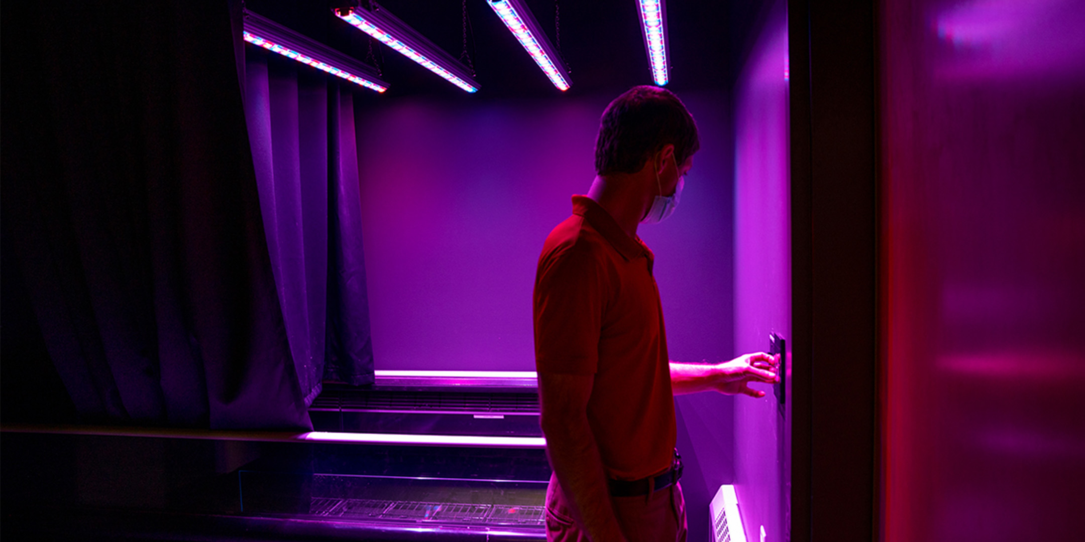 Dillon Walker, Plant Operations Manager, adjusts the lights in the Sensory Lab. picture by Michael P. King
