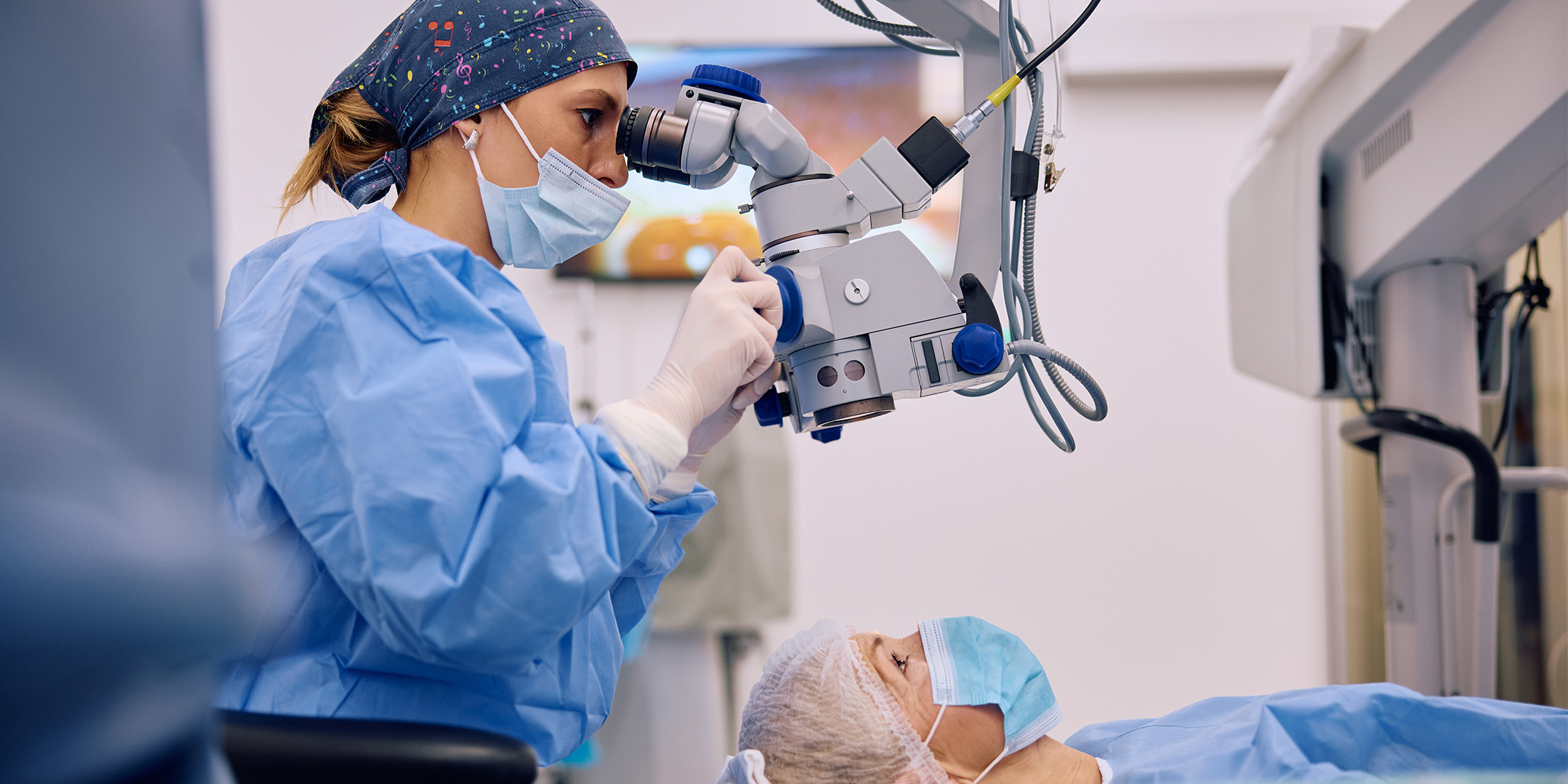 Eye doctor performing a test on a patient