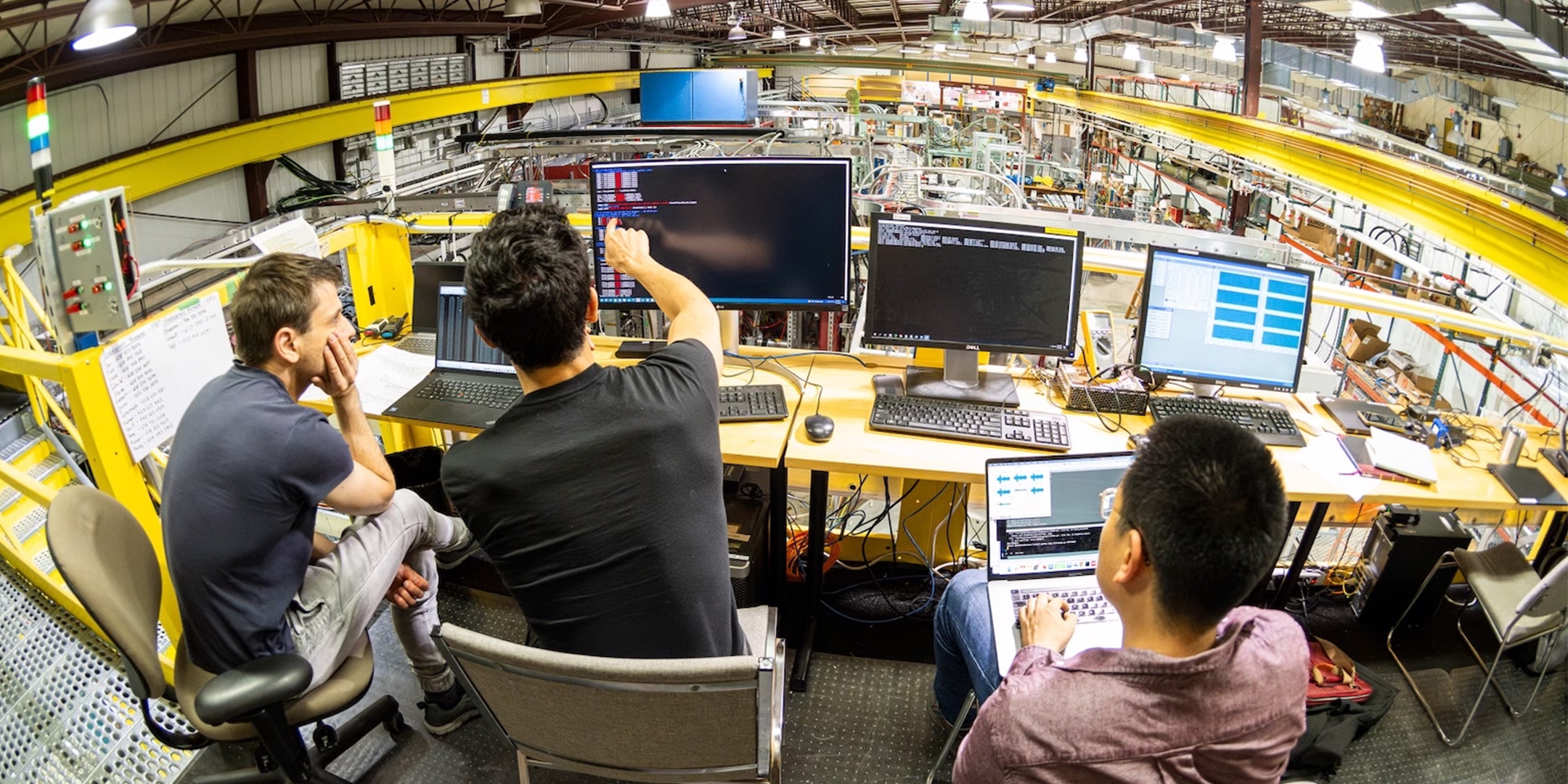 Researchers in the control room at Wisconsin HTS Axisymmetric Mirror Project (WHAM) working on capturing a plasma.