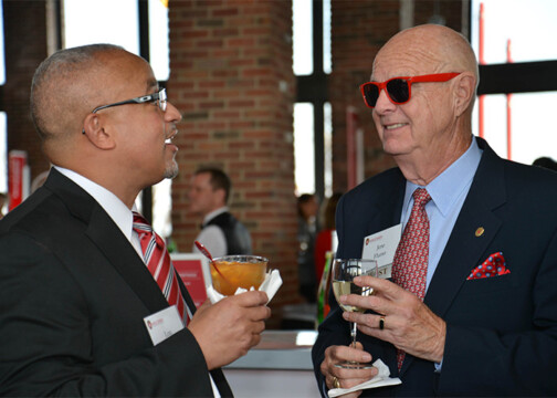 Lou Holland Jr and Jere Fluno talking