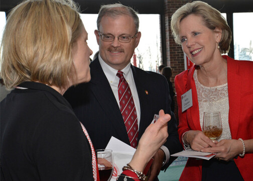 Attendees of the event talking with each other