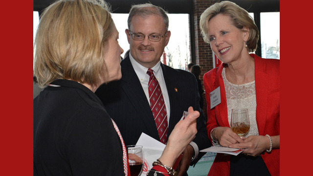 Attendees of the event talking with each other