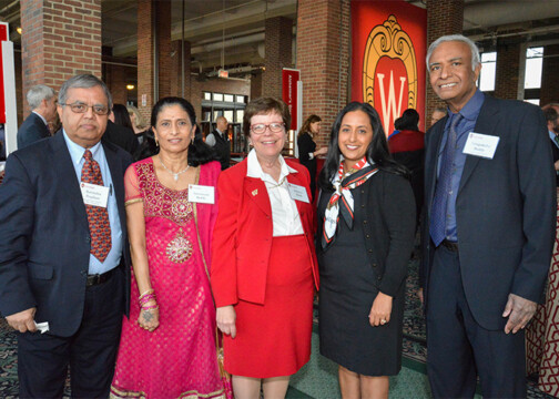 Chancellor Rebecca Blank with others smiling