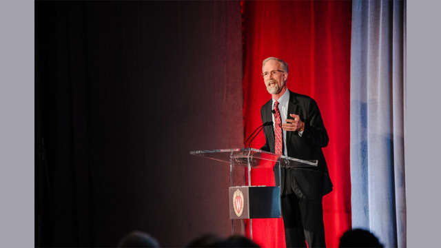 Professor Cronon speaking on stage