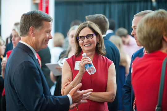Attendees talking with each other