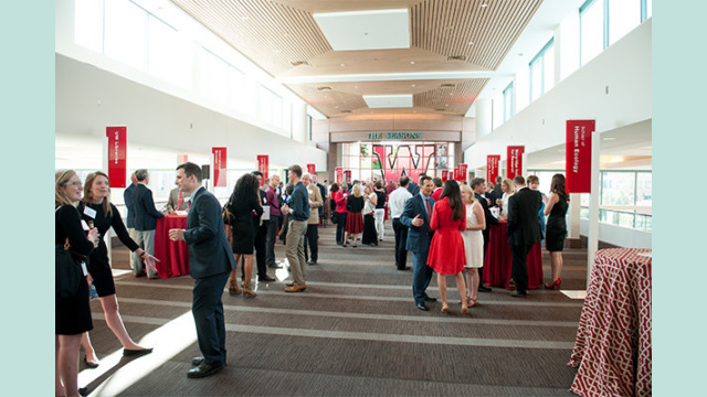 Attendees in a large hallways