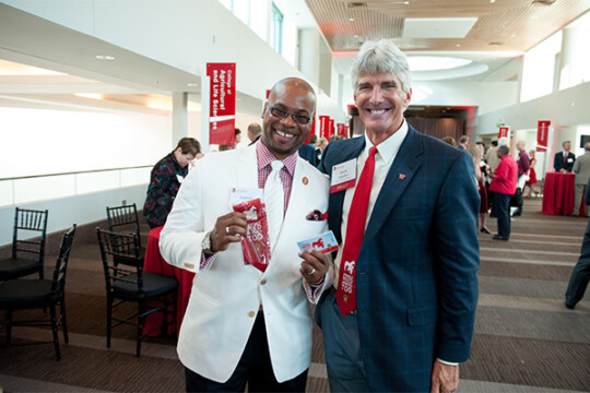 Attendees smiling for a photo