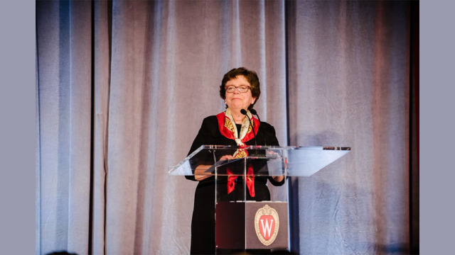 Chancellor Rebecca Blank speaking on stage