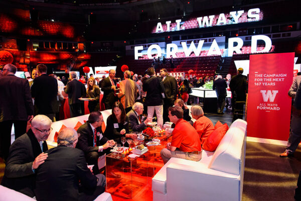 Attendees engaging in conversation