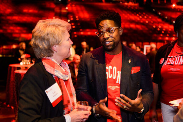 Attendees engaging in conversation