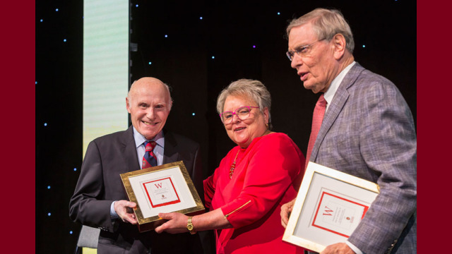 Herbert H. (Herb) Kohl ’56 and Allan H. (Bud) Selig ’56 being presented the Distinguished Alumni Award
