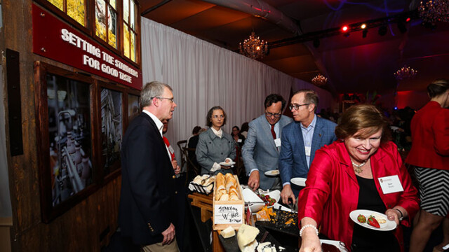 Attendees enjoying the rolling supper