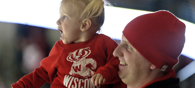Father and Daughter enjoy Badger game
