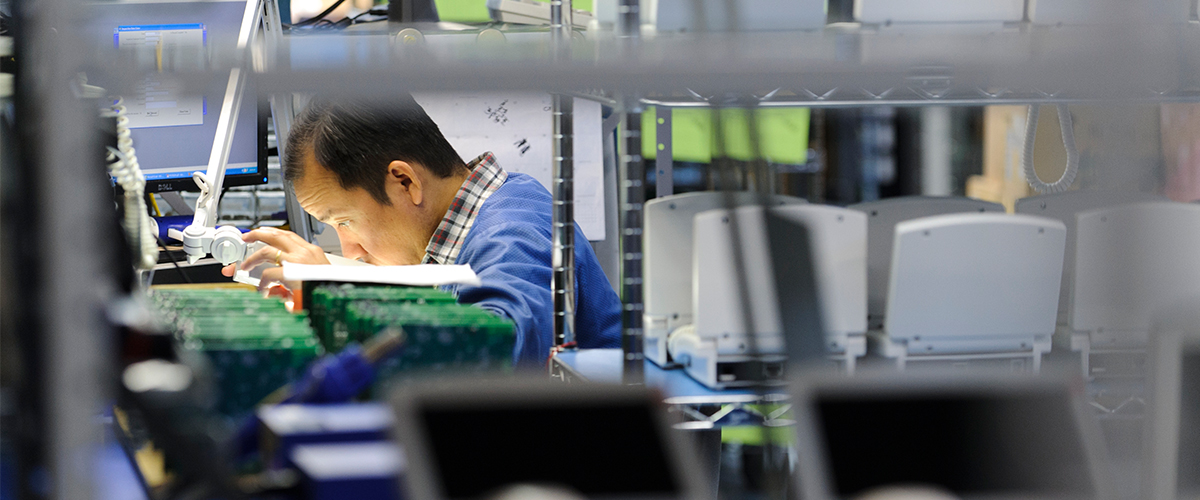 Person focusing intently in a technological space
