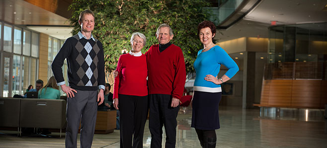 Pictured with the Morgridges is the Morgridge Chair in Reading and Literacy, Gay Ivey, right, who joined the School of Education faculty in 2012. Her research focuses on the development of productive and motivating classrooms for struggling young adolescent readers. Associate Professor Shanan Peters, left, was named Morgridge Chair of Geoscience in 2012. His work concentrates on better understanding the evolution of life and the environment through the innovative use of geoinformatics to explore the geologic record.